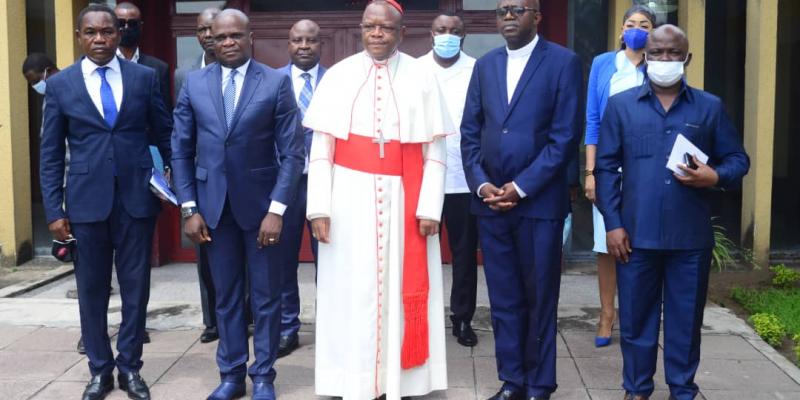 le cardinal Ambongo après échange avec le ministre de l'EPST Willy Bakonga/Ph. droits tiers