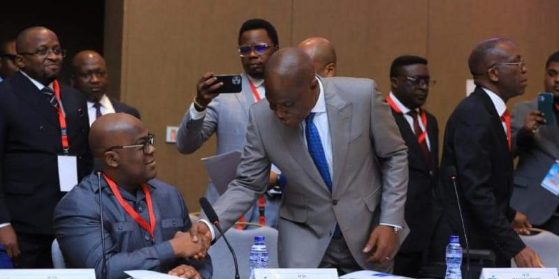Félix Tshisekedi et Martin Fayulu lors d'une rencontre organisée par la CENI pour les candidats présidents de la République en 2023